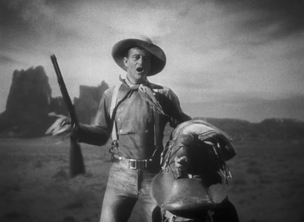 John Wayne em cena do filme "No tempo das diligências", de John Ford.