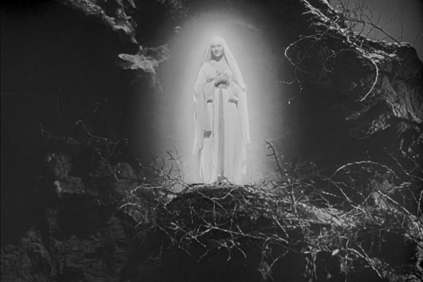 Cena retratando a aparição de Nossa Senhora de Lourdes no filme "A canção de Bernadette" - Lumine TV